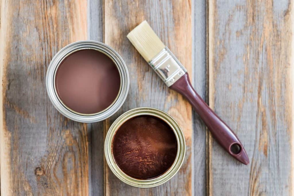 Cans of stain that is used as a wood colorant