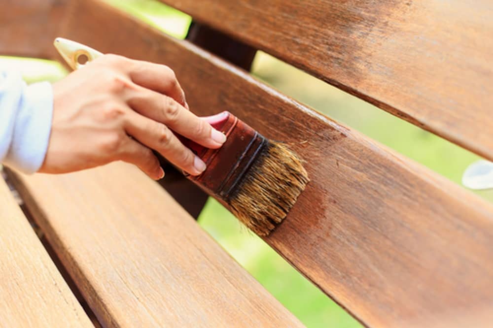 Applying Spar Urethane on a Bench