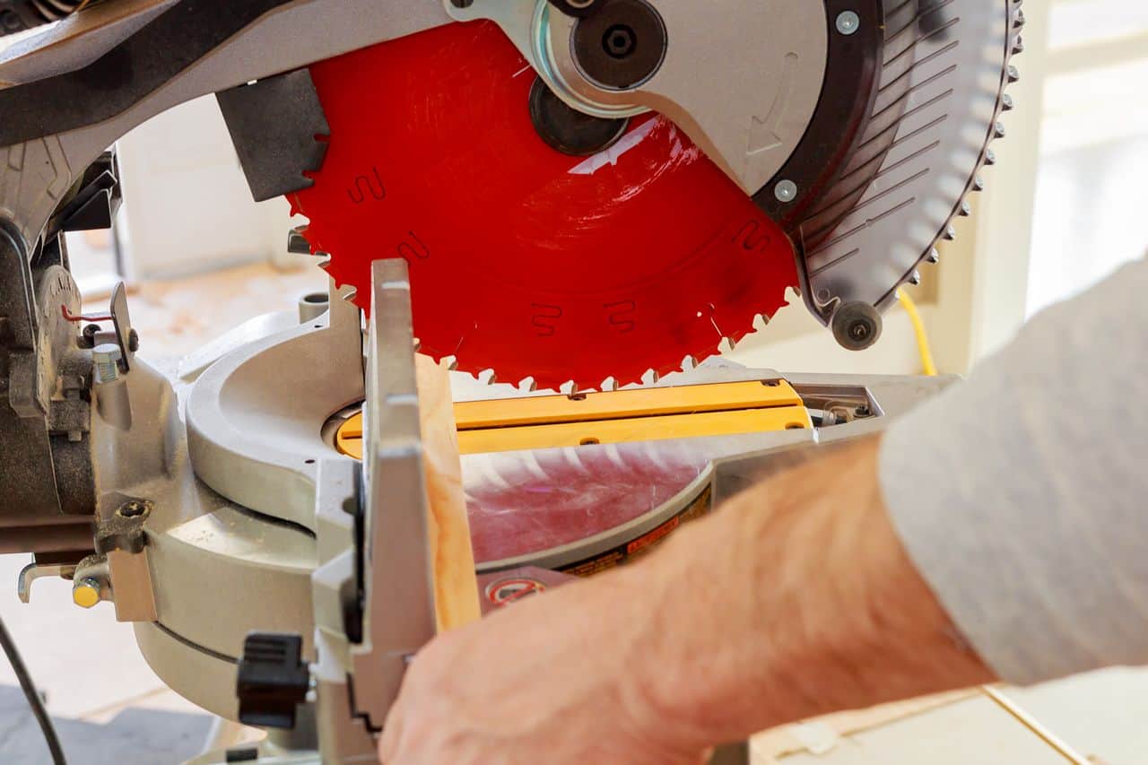 Sawing particle board with a miter saw